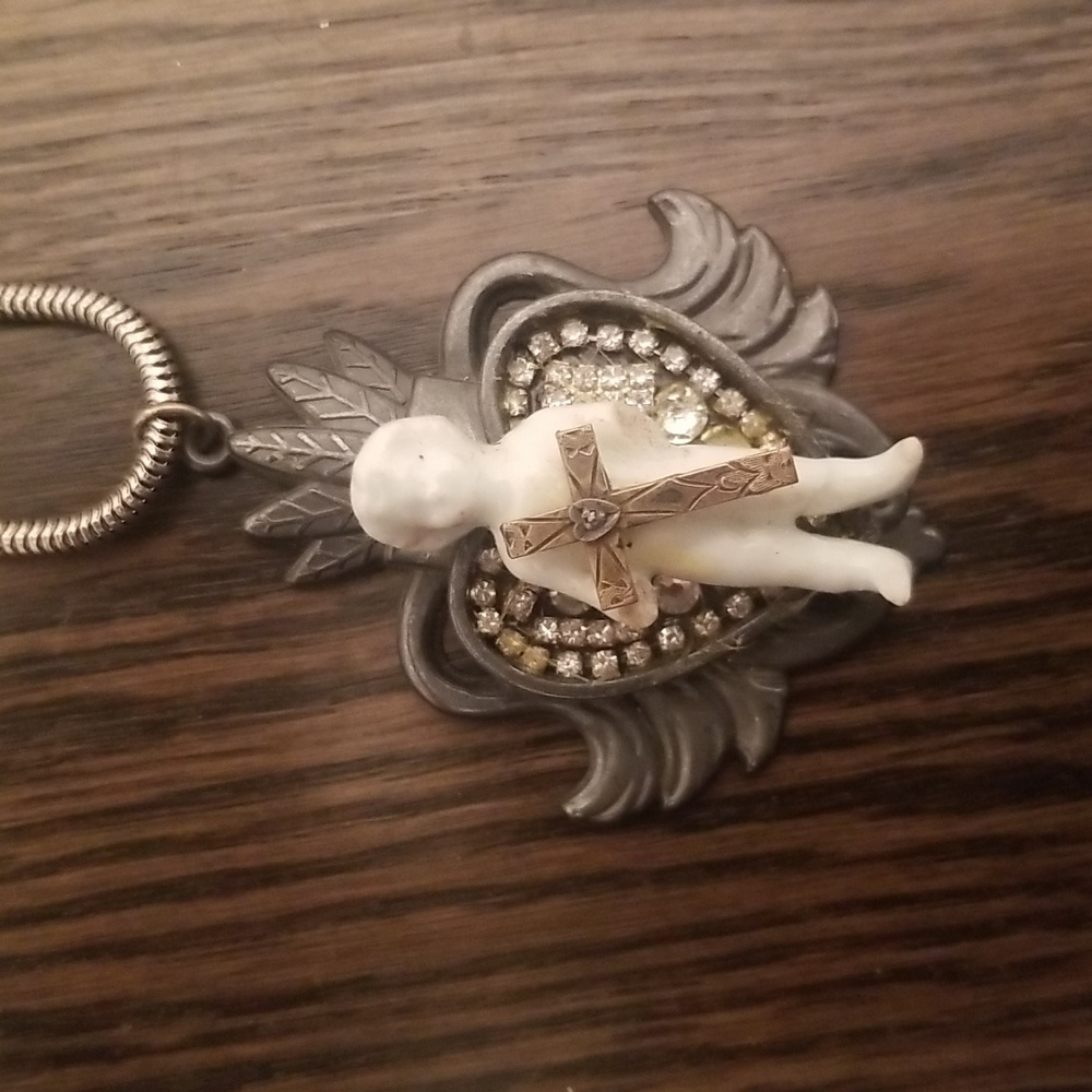Frozen Charlotte necklace as found